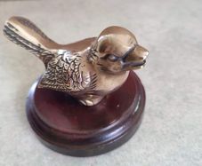 Vintage Brass Bird On Wood plaque/felt bottom.