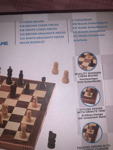 Boxed wooden chess board, prices and checkers set
