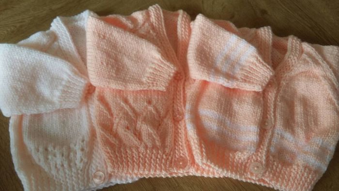 Beautiful hand knitted baby cardigans