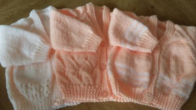 Beautiful hand knitted baby cardigans