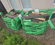 Decking timber (cut-up, not rotten) with screws still