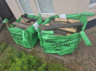 Decking timber (cut-up, not rotten) with screws still