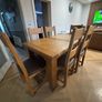 Extendable Solid Oak Dining Table & 6 leather dining chairs Image 4