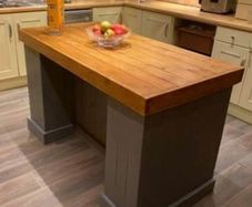 Rustic kitchen island with pillars