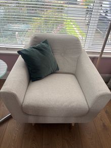 Light grey armchair perfect condition.