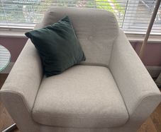 Light grey armchair perfect condition.