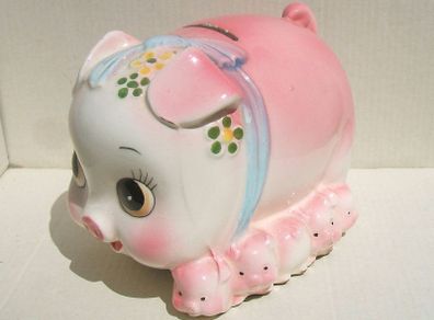 A vintage ceramic piggy bank with its original rubber bung (late 1960's)