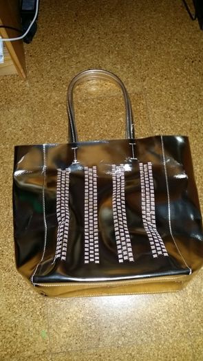 Estee Lauder gold bag