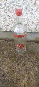 Smirnoff volka 3 litre bottle ,,with cork ,nice patina condition, handy for 1 or 2 euro coins ,etc ,,or display advertising item for home bar etc ,sold as is,