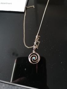 Sterling silver charm.