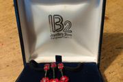 red poppy flower design Necklace  sold by independent jewelers like IB2 Jewellery Store. New in box.