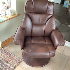 leather armchair with footstool. In perfect order. Back reclines when you sit in it. Very comfortable. Open to reasonable offers