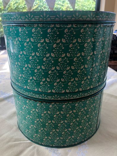 selection of vintage cake storage tins with lids