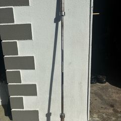 barbell and 100kg plates