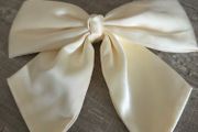 Cream/ivory bow hair clip. Elegant and feminine design with long tails, perfect for weddings, parties, special occasions or everyday wear. Like new never used