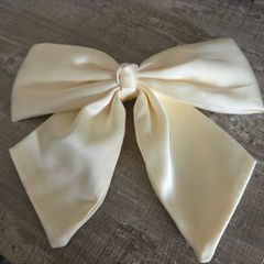 Cream/ivory bow hair clip. Elegant and feminine design with long tails, perfect for weddings, parties, special occasions or everyday wear. Like new never used