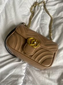 brown tan and gold bag