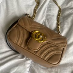 brown tan and gold bag