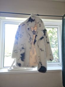 cow print fur coat