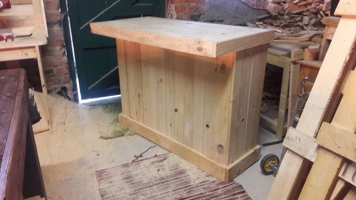Rustic kitchen island with overhang