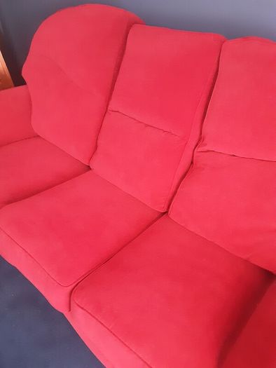 Large dark pink sofa immaculate condition size 80inchs long