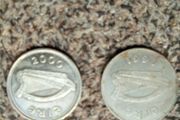 1990.  And.  2000.  Millenium. Pound. Coins