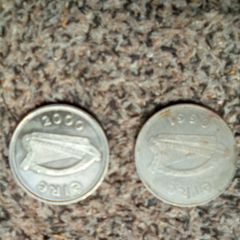 1990.  And.  2000.  Millenium. Pound. Coins