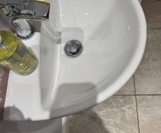 Bathroom sink, toilet, radiator