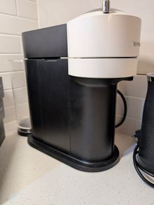 Nespresso Vertuo Coffee Machine Bundle + Lavazza Frother, Chrome Pod Stand & 22 Pod Boxes