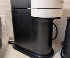 Nespresso Vertuo Coffee Machine Bundle + Lavazza Frother, Chrome Pod Stand & 22 Pod Boxes