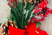 Collection of artificial red poinsettia and berry
