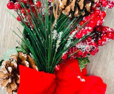 Collection of artificial red poinsettia and berry
