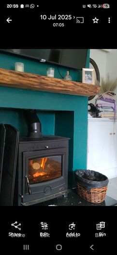 18kw stove, hearth and custom made mantlepiece