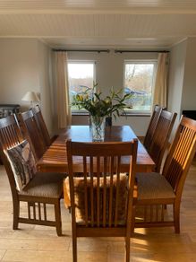 Beautiful long dark Oak Dining table and 8 chairs