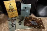 WW2 German documents with an eagle pin and an identification tag for one soldier