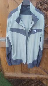 Druids sage colour golf jacket and trousers