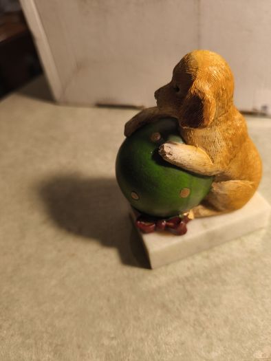 Vintage  Puppy Figurine Holding a ball on marble plinth