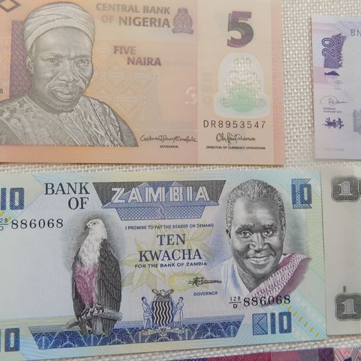 Lot of 9 Uncirculated Banknotes from Africa.No 14.