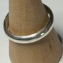 Handmade sterling silver ring with flush set stones. Size O Image 4