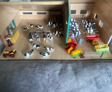 1:32 scale kids globe wooden farm shed with toys.