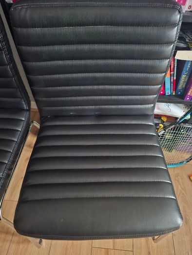 3 faux leather chairs