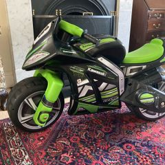 Ride on motorbike toy