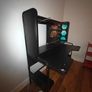 Black gaming desk with integrated pegboard and shelf Image 2