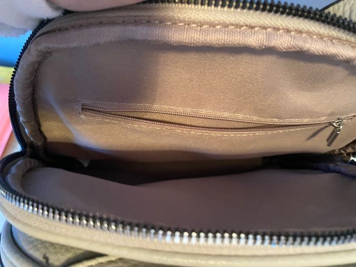 Grey leather effect backpack