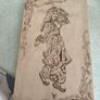a piece of wood art featuring a pyrography (wood-burning) design of a woman in traditional attire. Image 4