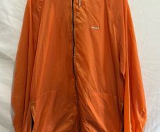 Orange windbreaker jacket from Hard Adventure