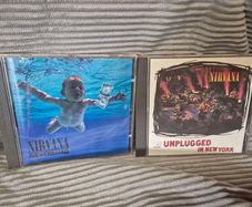 Various single albums all unscratched in great shape CDs..Nirvana etc