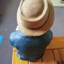 Resin sculpture of a seated boy Image 6