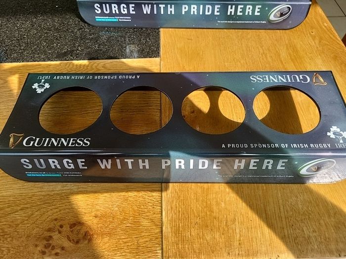 guinness rugby glass holder with 4 pint glasses