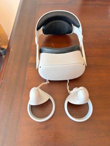 Meta Quest 2 Virtual reality headset. With 2 controllers. In near perfect condition ( barely used ). Has been restored to factory settings. Charges via usb C ( NOT included ). Original head strap was faulty so it had to be replaced.